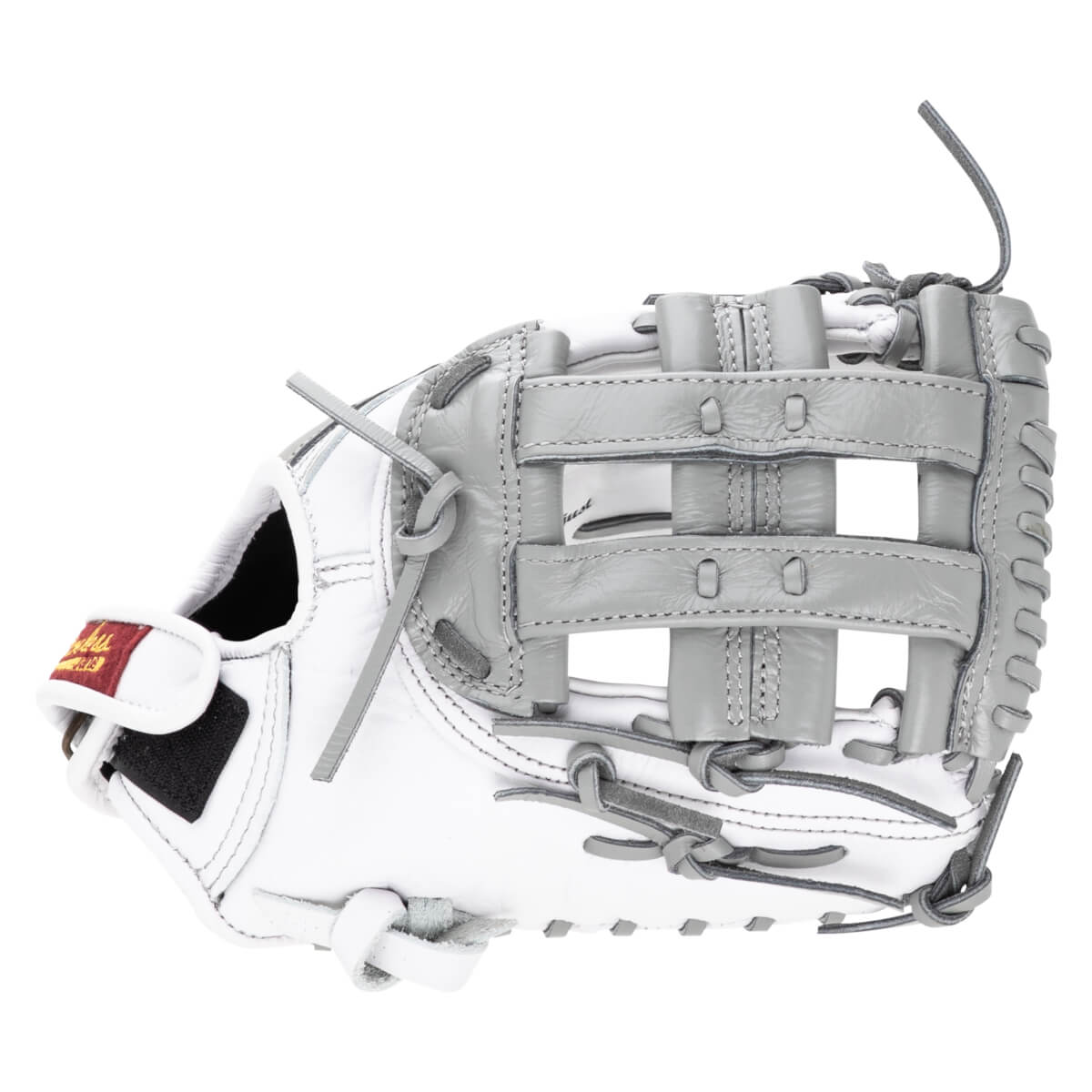 Side view of a white and gray baseball glove with a red and gold tag.