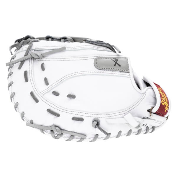 Side view of a white baseball glove with grey lacing and a maroon wrist strap with gold "Shoeless Joe" lettering.