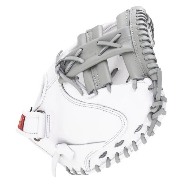 Top-down view of a white baseball glove with gray lacing and a red tag.