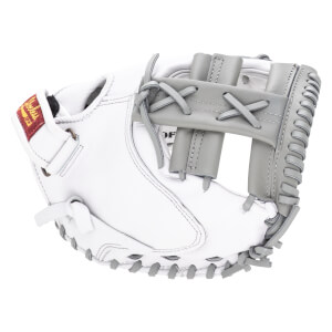 Side view of a white baseball glove with grey lacing and a red "Shoeless" tag.