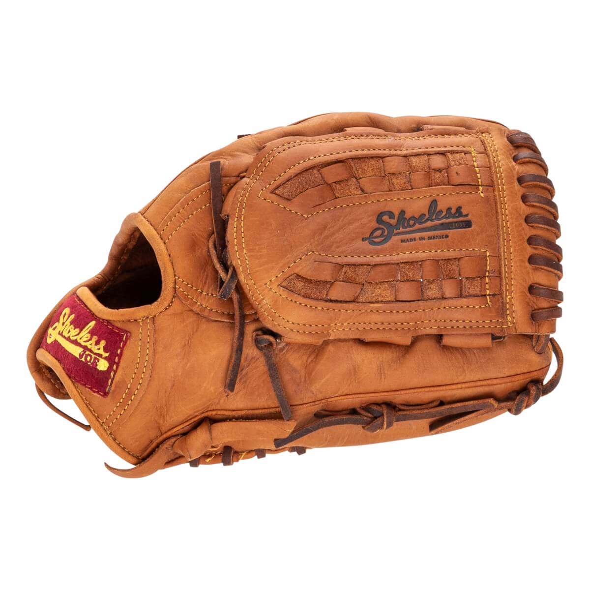 Side view of a brown baseball glove with Shoeless Joe logo on the palm, woven leather pattern, and a red wrist tag.