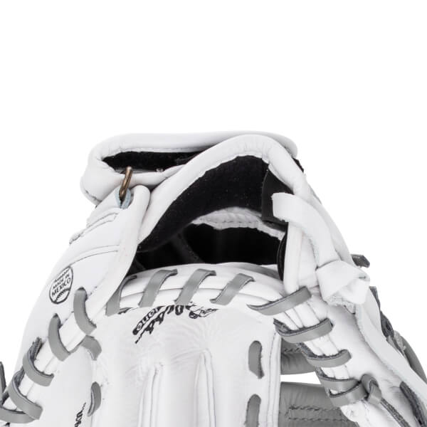 Close-up view of the white leather wrist opening featuring gray laces, a small brass ring, and the "Shoeless Jane" brand name with a "MADE IN MEXICO" stamp.