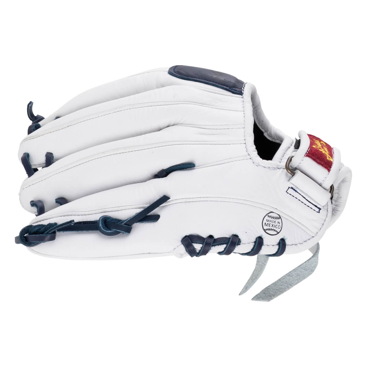Back view of the white leather fastpitch glove showing navy blue laces, a red wrist strap logo, and a circular "MADE IN MEXICO" stamp on the heel.