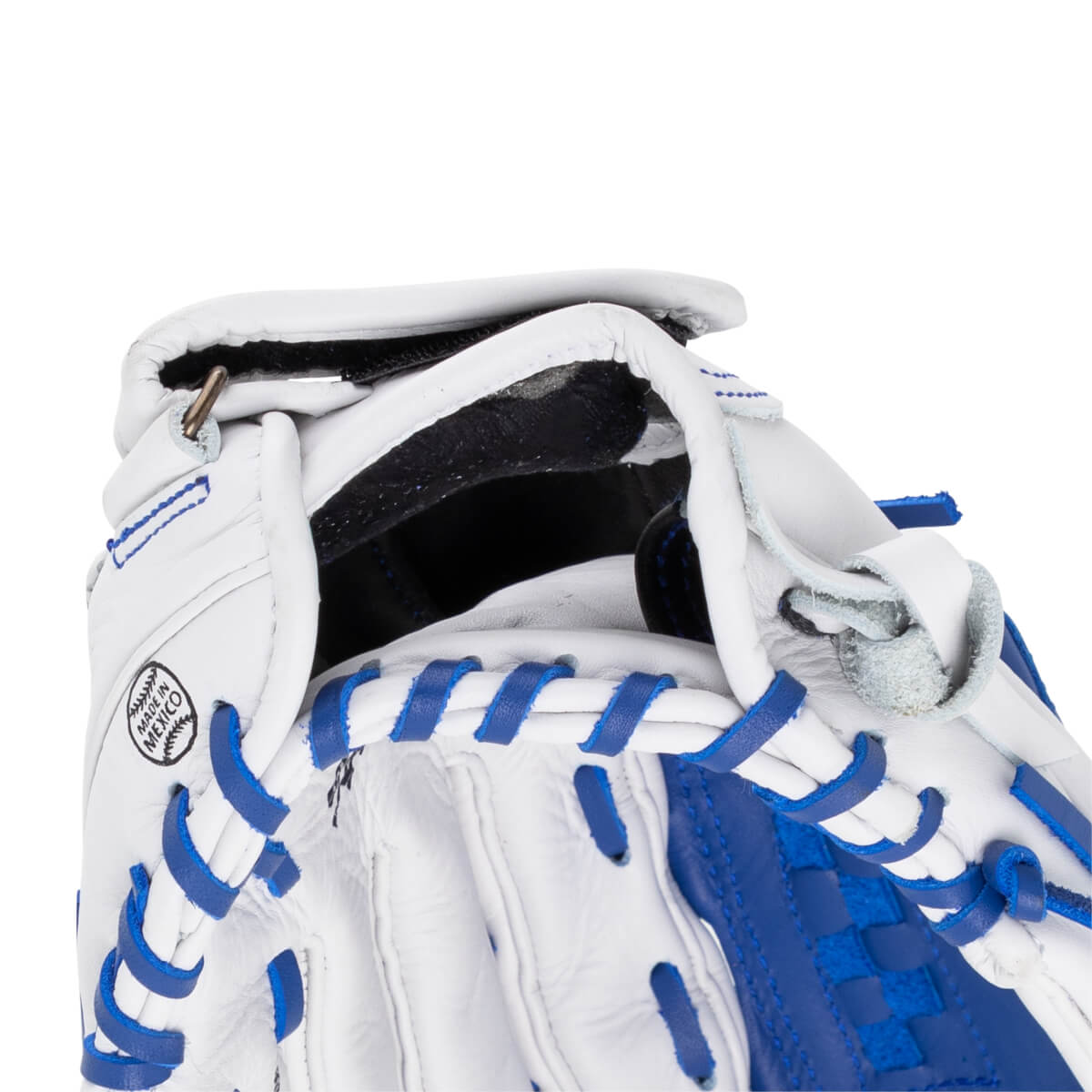 Close-up shows the inside of a white and blue Shoeless Joe glove with "MADE IN MEXICO" visible.