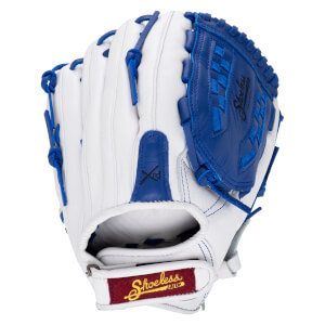 Front view of a white and blue fastpitch softball glove with "Shoeless" text visible on the wrist strap.