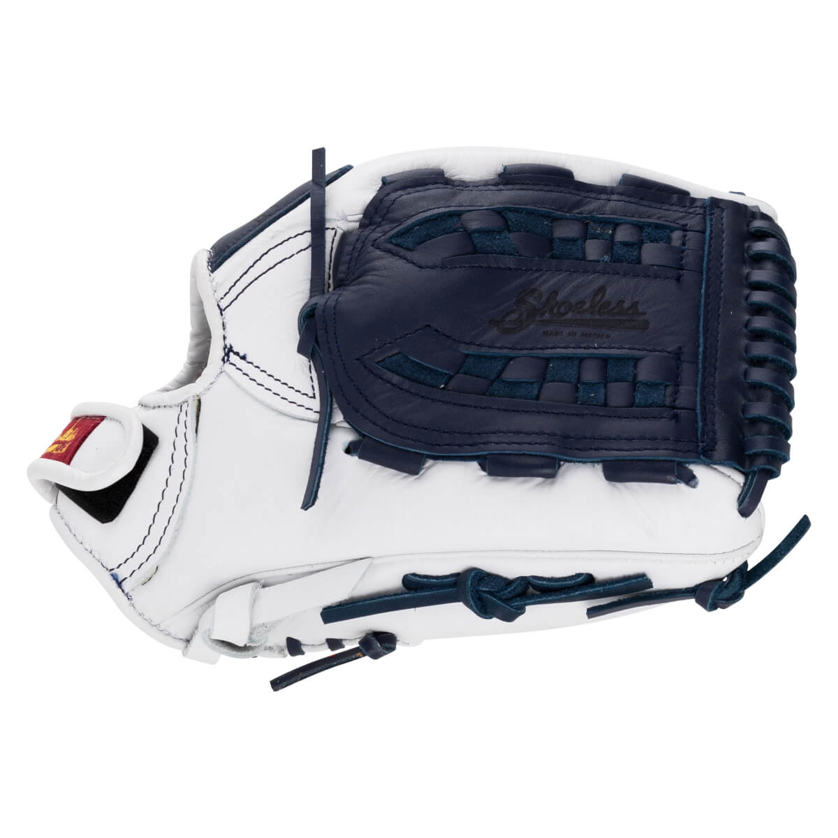 Side view of a white and navy Shoeless Joe Professional Series glove with "Shoeless" logo visible.