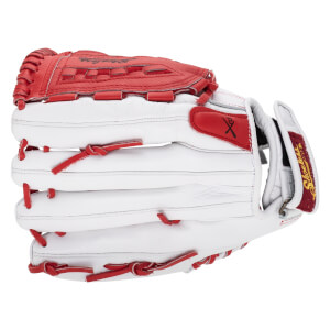 Close-up view of a white fastpitch softball glove with red lacing and details, showing "Shoeless" text.