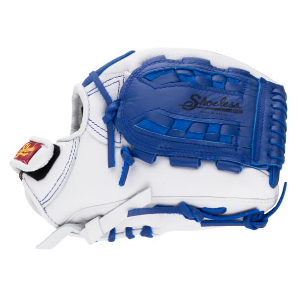 Back view of a white fastpitch softball glove with blue accents, featuring Shoeless and MADE IN MEXICO text on the closed web and a red and yellow brand patch.