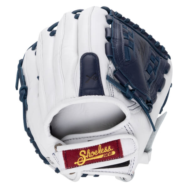 Back view of a white and navy softball glove featuring a closed web and a red wrist strap patch with the yellow embroidered words Shoeless Jane.