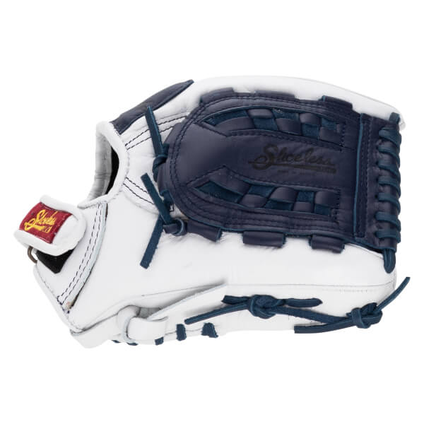 Back view of a white leather fastpitch softball glove featuring a navy blue basket weave web stamped with “Shoeless” and a red and gold brand patch.
