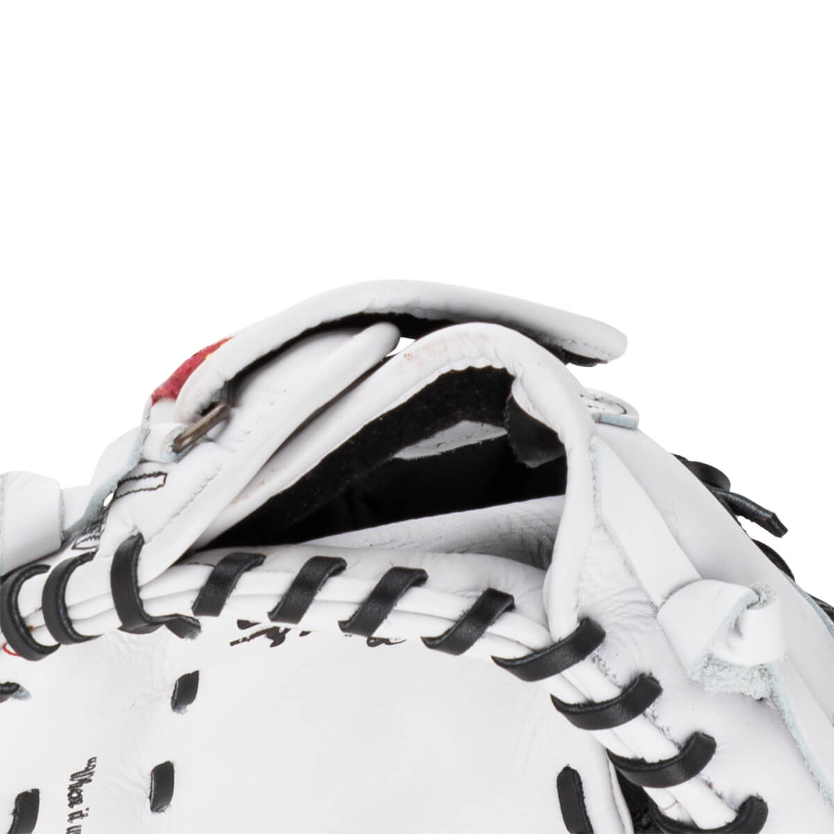 Close-up of the wrist opening on this white leather first base mitt featuring black interior padding, black laces, and an adjustable strap.