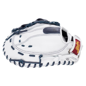 Back view of a white leather catcher's mitt with navy blue laces and a maroon wrist strap featuring "Shoeless Joe" in gold script.
