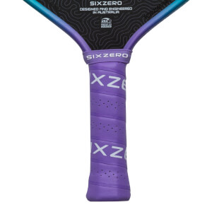 Close-up of a purple pickleball paddle grip with "SIX ZERO" and "XZ8" visible.