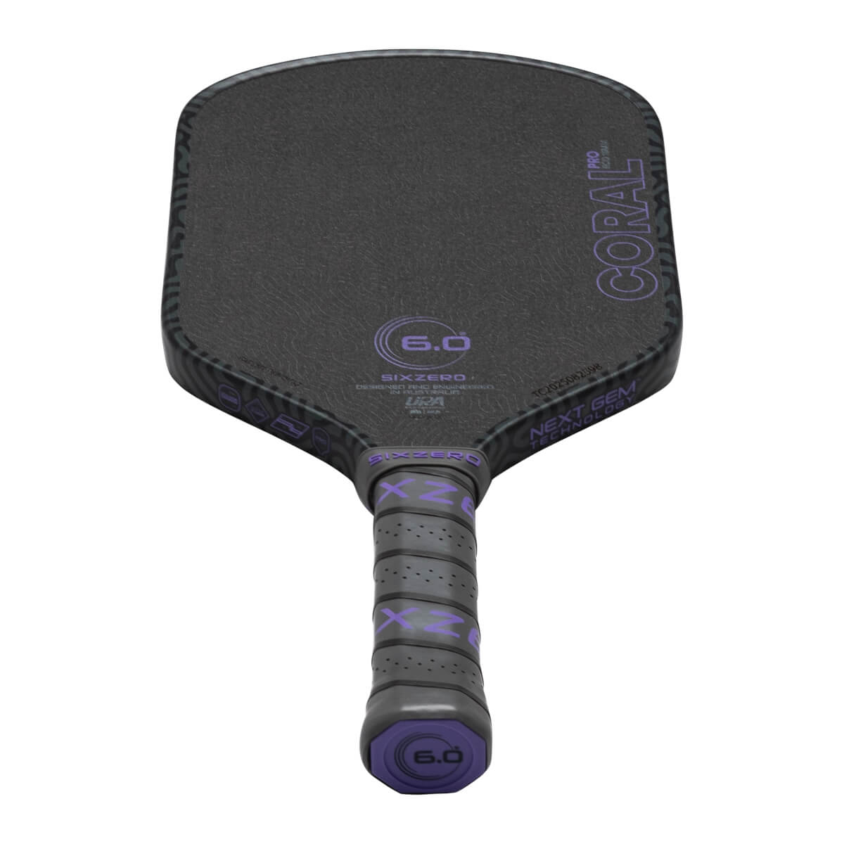 Top-down view of a black pickleball paddle with purple "CORAL PRO" text and a "6.0" logo.
