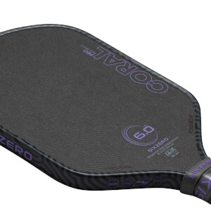 Top-down view of a pickleball paddle showing the "CORAL" logo, "6.0" rating, and "SIXZERO" branding.