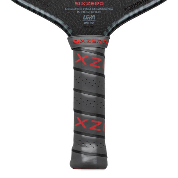 Close-up of the grip showing red "SIX ZERO" text and textured gray material.