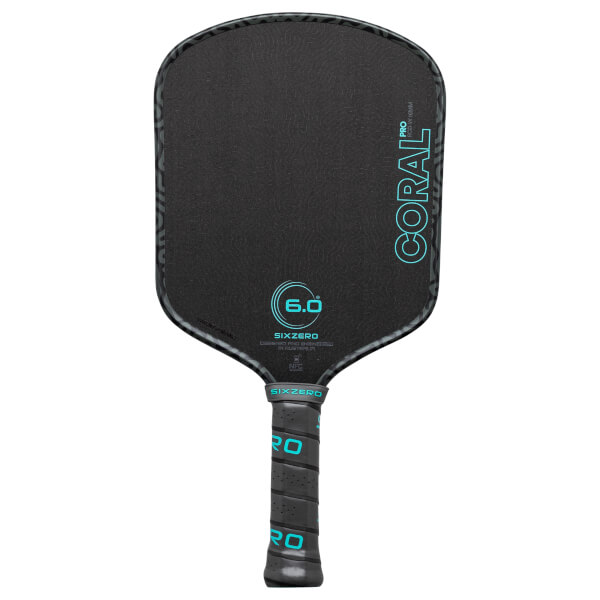 Front view of a black pickleball paddle with "CORAL PRO 6.0" in turquoise text and a textured surface.