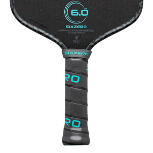 Top-down view of a black pickleball paddle with a textured surface, a "6.0" logo, and "SIXZERO" text.