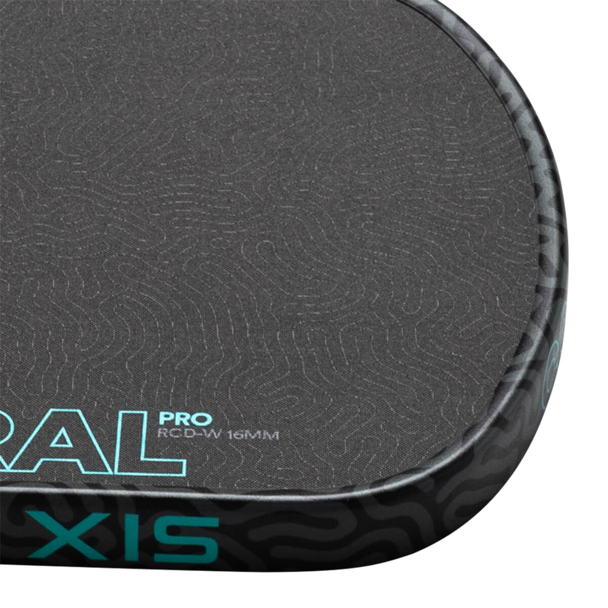 Corner view of a dark grey paddle with a textured surface, showing "ORAL PRO RCD-W 16MM" and "XIS" in teal lettering.