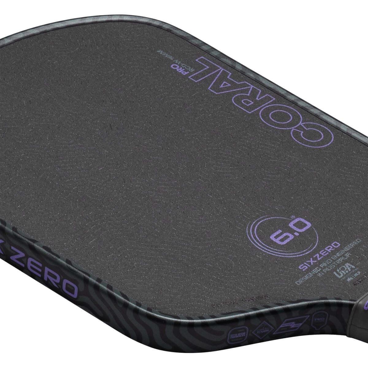 Top-down view of a pickleball paddle showing the "CORAL" and "SIXZERO" logos, and a "6.0" indicator.