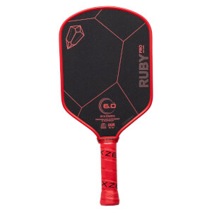 Front view of a black and red pickleball paddle with a geometric pattern, RUBY PRO text, and a red SIX ZERO grip.