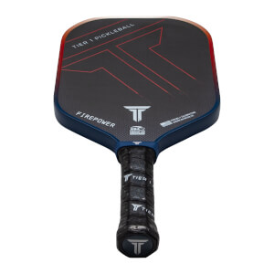 Top-down view of a black pickleball paddle with red accents, "TIER 1 PICKLEBALL" text, and a "FIREPOWER" label.