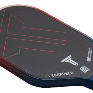 Close-up of a pickleball paddle showing red geometric lines, the "FIREPOWER" text, and a "USA PICKLEBALL APPROVED" logo.