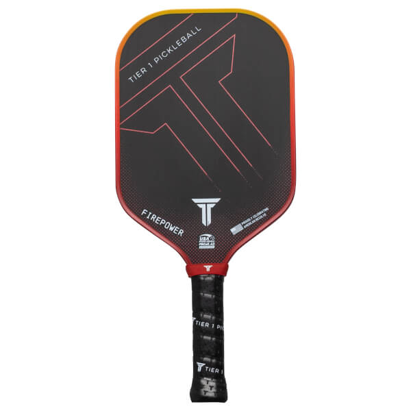 Front view of a black pickleball paddle with red and yellow accents, featuring "TIER 1 PICKLEBALL" and "FIREPOWER" text.