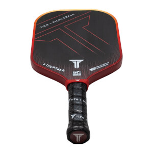 Top-down view of a red and black pickleball paddle with "TIER 1 PICKLEBALL" and "FIREPOWER" text.