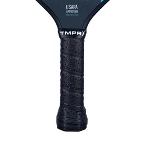 Close-up of a black pickleball paddle grip with TMPR branding and USAPA approved text.