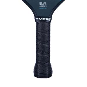 Close-up of a black pickleball paddle grip with a textured surface and the TMPR logo.