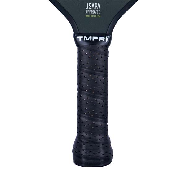 Close-up of a black pickleball paddle grip with TMPR branding and USAPA approved text.