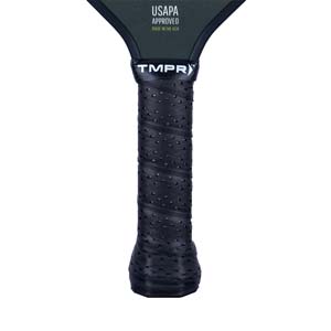 Close-up of a black pickleball paddle grip with TMPR branding and USAPA approved text.