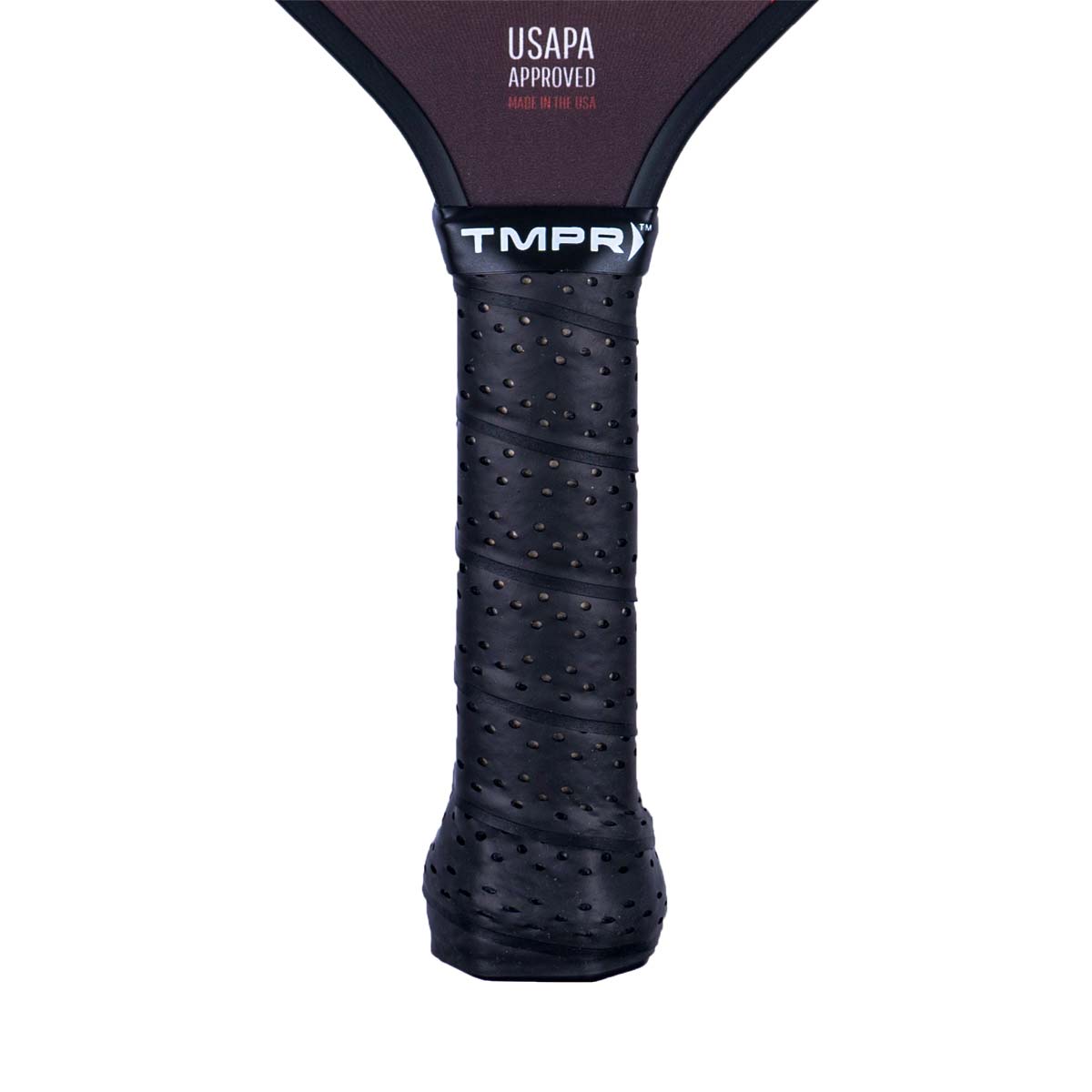Close-up of a black pickleball paddle grip with perforated texture and TMPR branding.