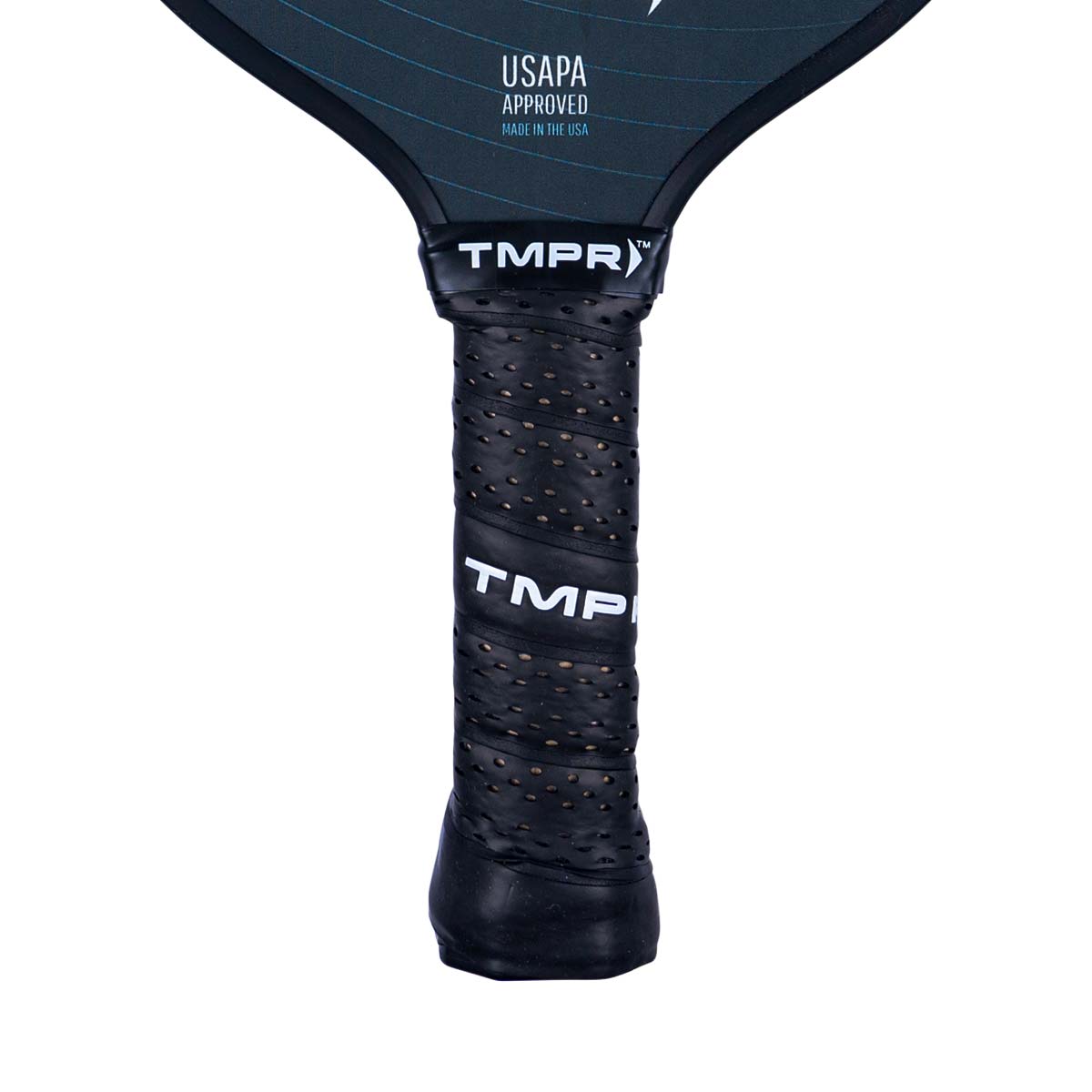 Close-up of a black pickleball paddle grip with perforations and visible TMPR branding.