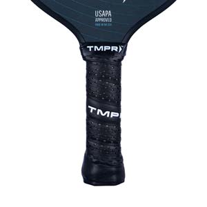 Close-up of a black pickleball paddle grip with perforations and visible TMPR branding.