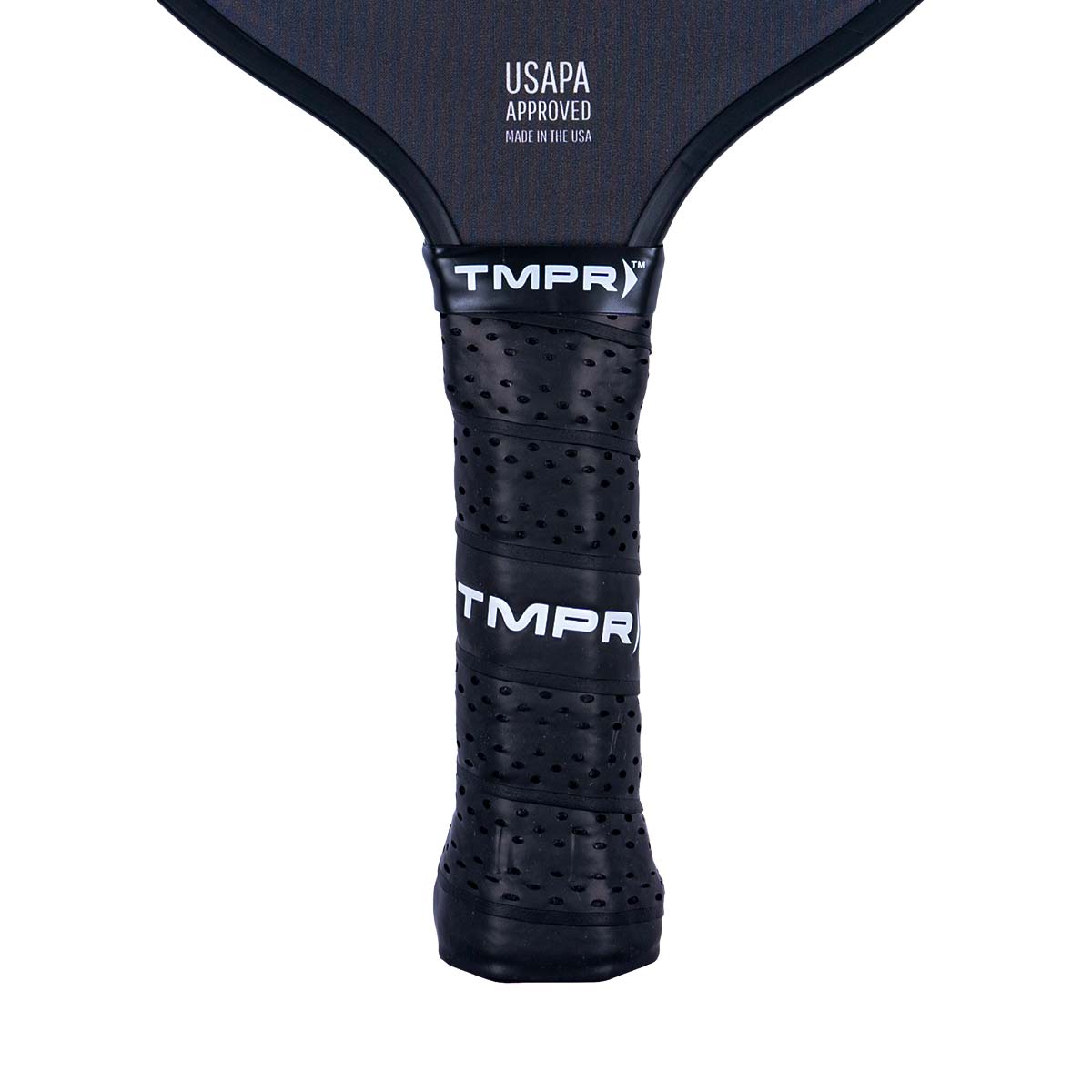 Close-up of a black pickleball paddle grip with TMPR branding and perforated texture.