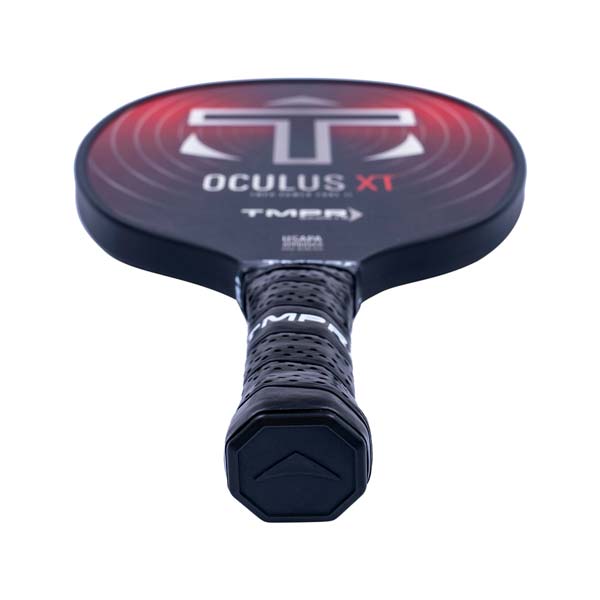 Top-down view of a black pickleball paddle with Oculus XT branding and a textured grip.