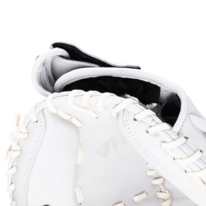Close-up of a white baseball glove showing the lacing and the "Rawlings" logo.
