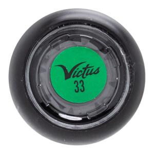Top-down view of a black baseball bat end cap with a green circular insert featuring the Victus logo and number 33.