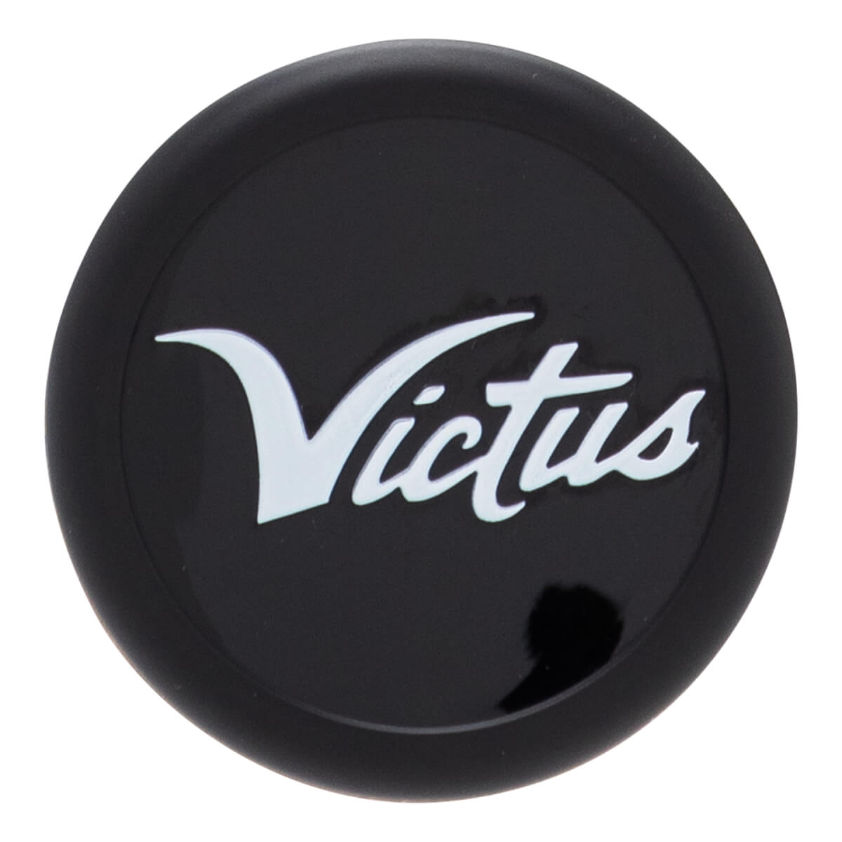 Close-up, top-down view of a black bat end cap with a raised white Victus script logo.