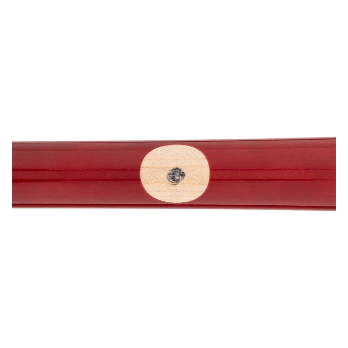 Close-up of a glossy red baseball bat with a light wood ink dot and a black mark.