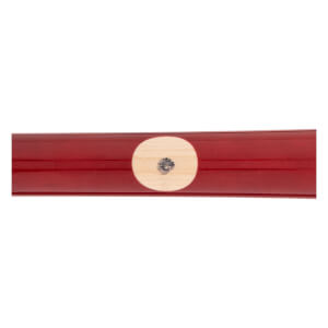 Close-up of a glossy red baseball bat with a light wood ink dot and a black mark.