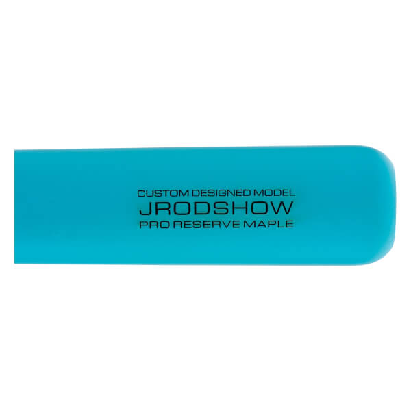 Close-up of a blue baseball bat with JRODSHOW and PRO RESERVE MAPLE text, and a rounded end.