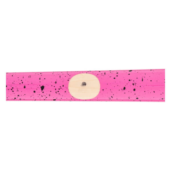 Close-up of a pink baseball bat with black speckles and a circular natural wood grain ink dot.