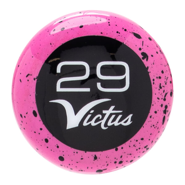 Top-down view of a pink baseball bat end cap with black speckles, a black center, and white 29 Victus branding.
