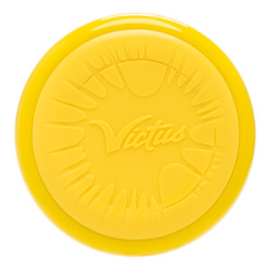 Top-down view of a yellow baseball bat end cap with an embossed Victus logo and claw-like patterns.