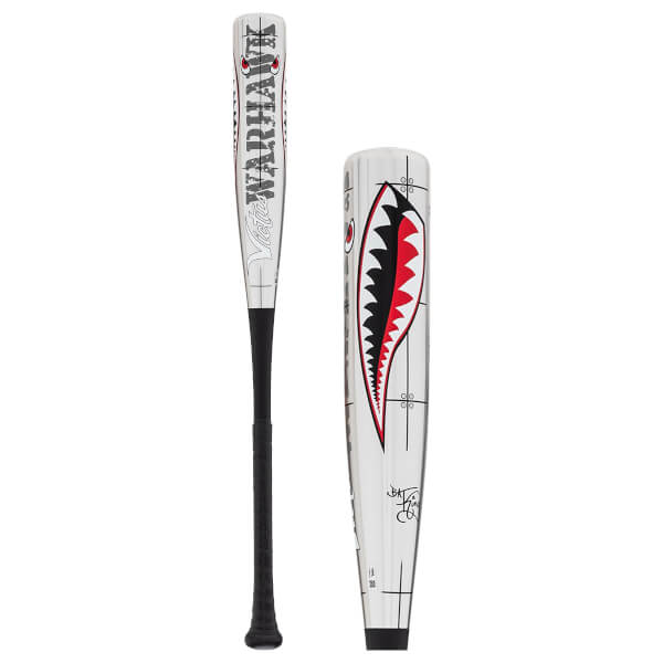 Side view of a white baseball bat with Victus Warhawk branding and a shark mouth graphic on its barrel.