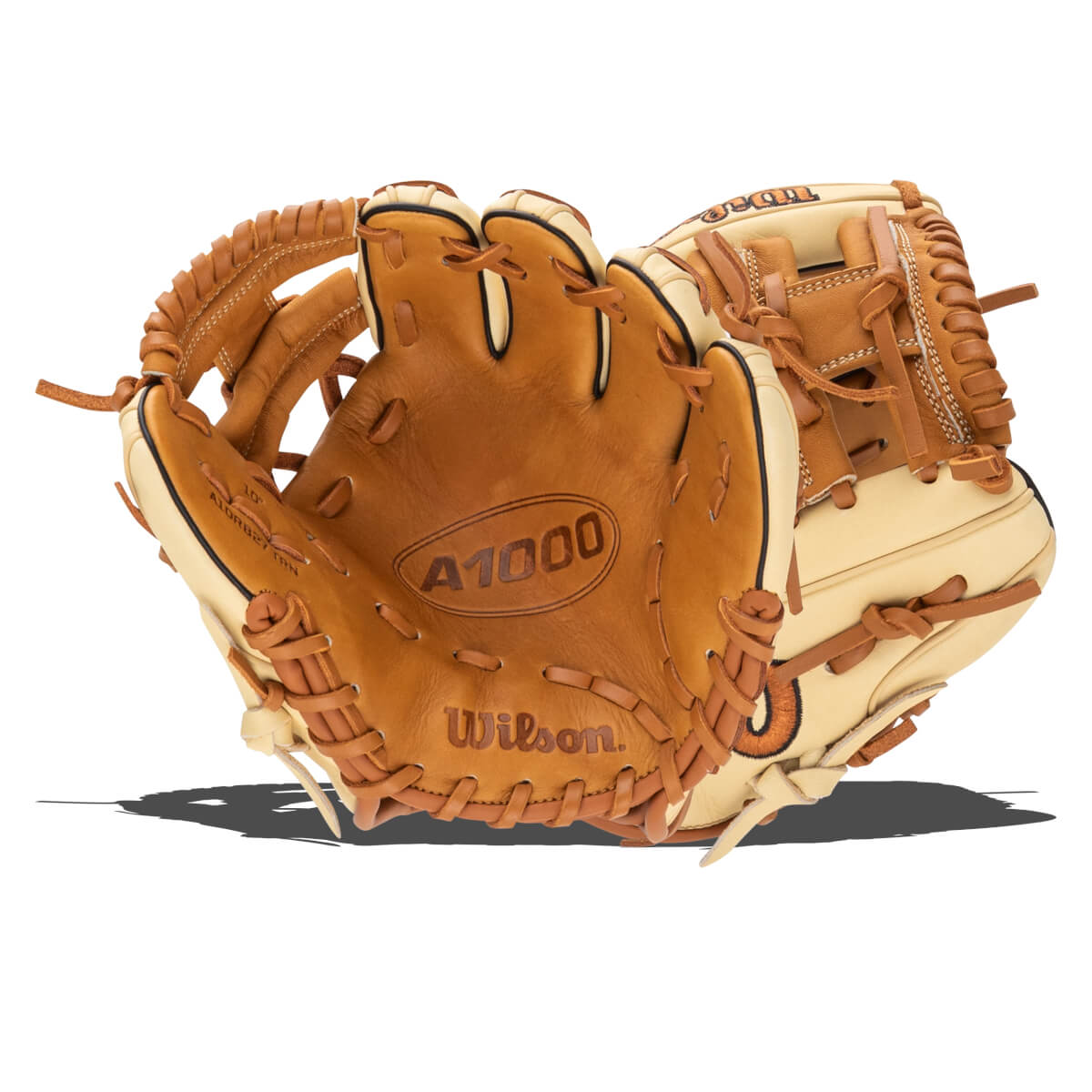 Front view of a tan Wilson A1000 baseball glove with tan lacing and a black binding.