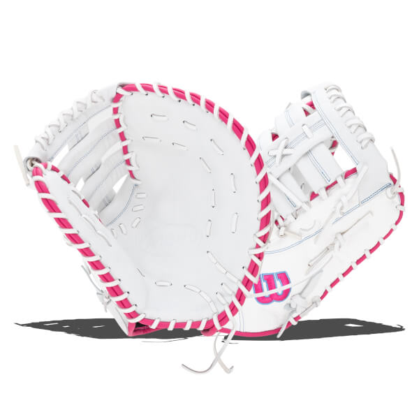 Front view of a white Wilson A1000 softball glove with pink lacing and a pink Wilson logo.